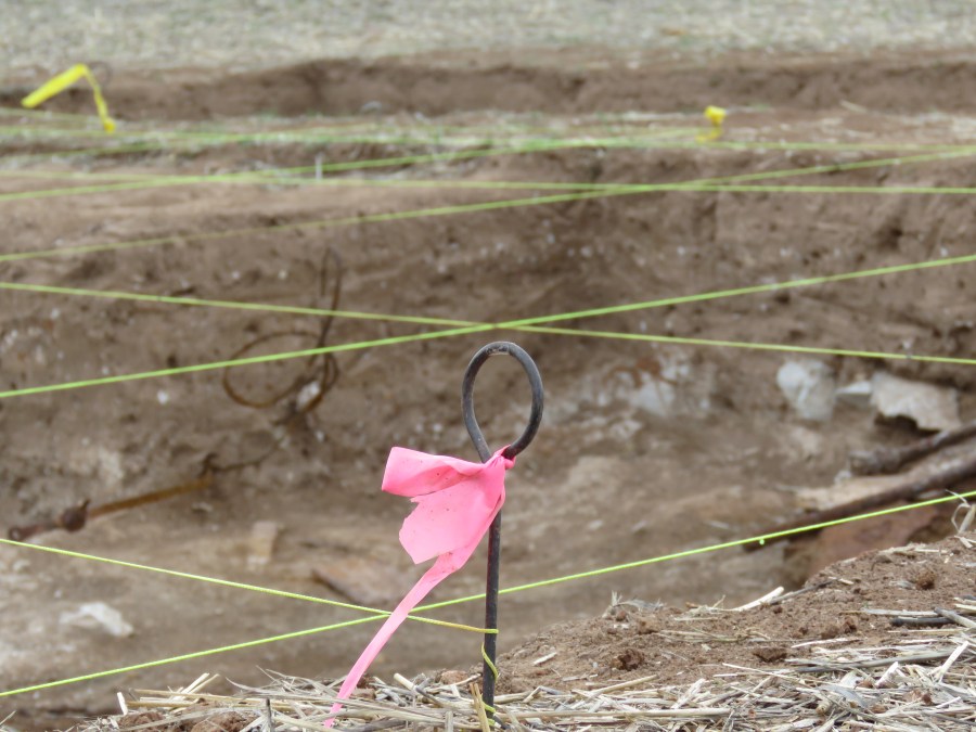 Pin flag and strings at Trench A.